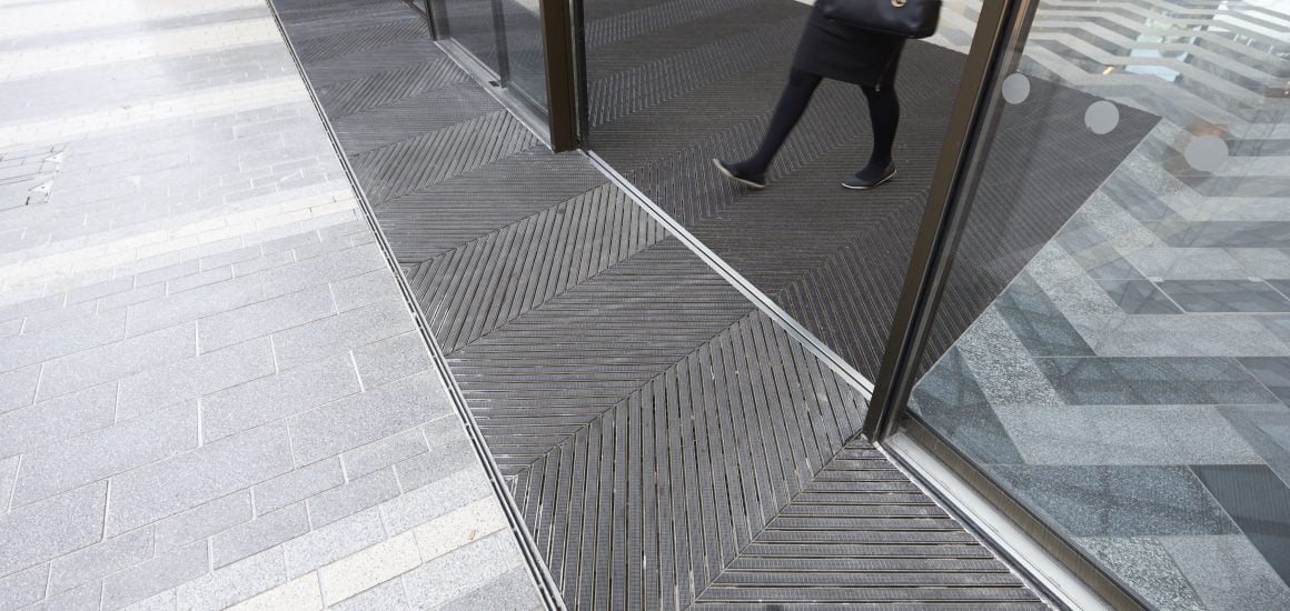 Person walking on Entrance Matting at Victoria Gate Shopping Centre Leeds