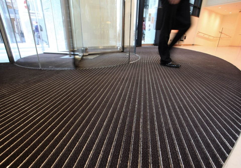 Picture of Entrance Matting with man walking across
