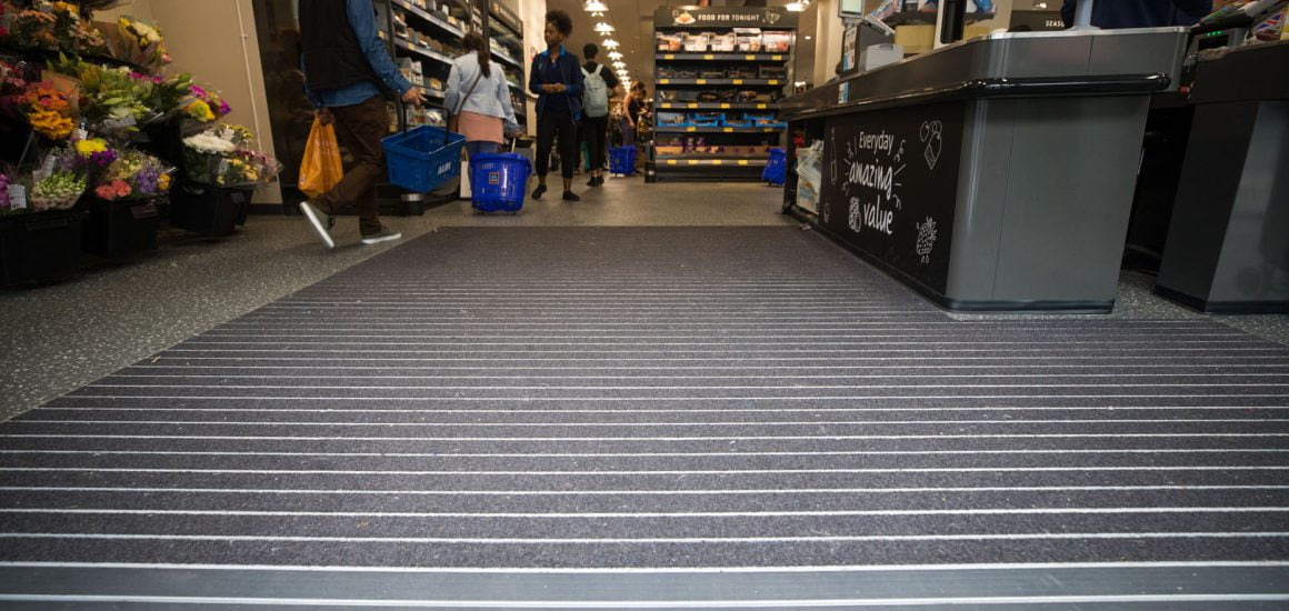 Image showing the entrance matting at a local high street shop