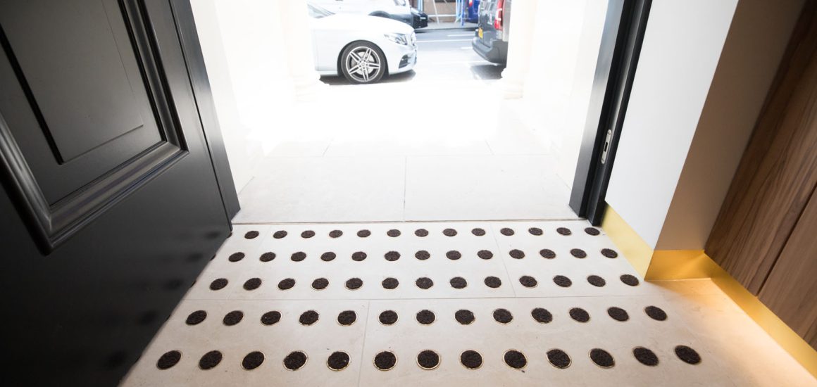 image showing the discs entrance matting laid in rows to form the entrance matting at this building