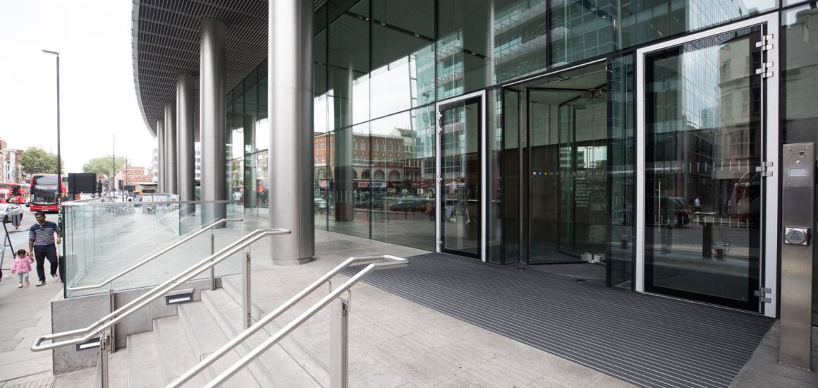Image showing the front of a commercial office with stairs in the foreground and the entrance in the background
