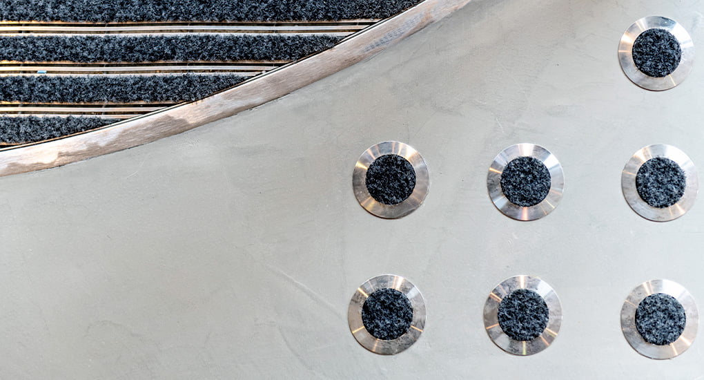 Linear and disc stainless steel entrance matting design