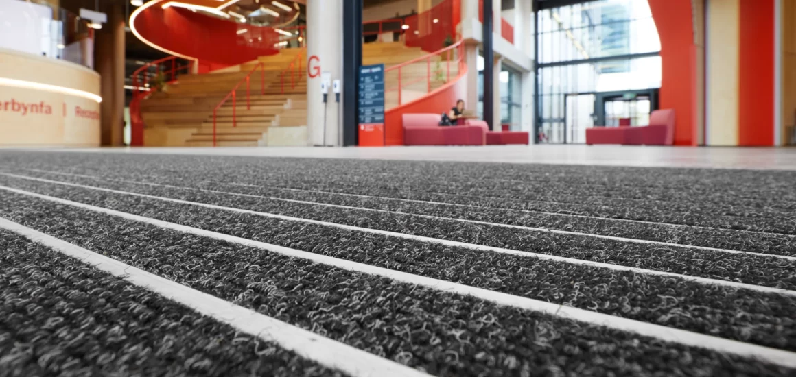 Matwell Sustainable Entrance Matting featuring replaceable inserts | INTRAsystems